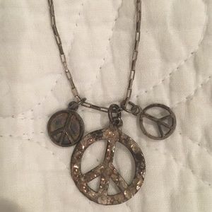 Silver Necklace with 3 Peace Charms.